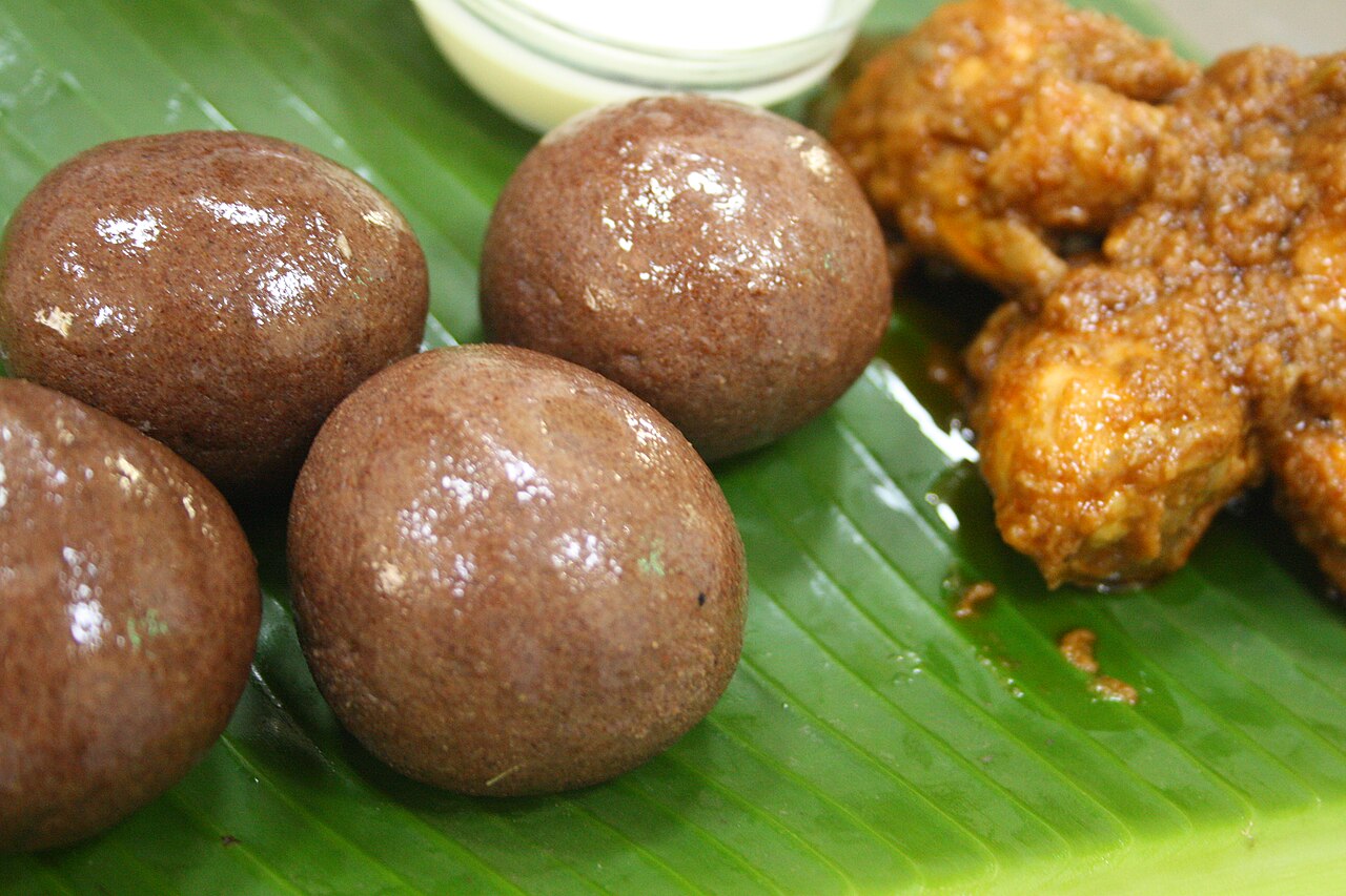 Ragi mudde, finger millet balls, with chicken curry