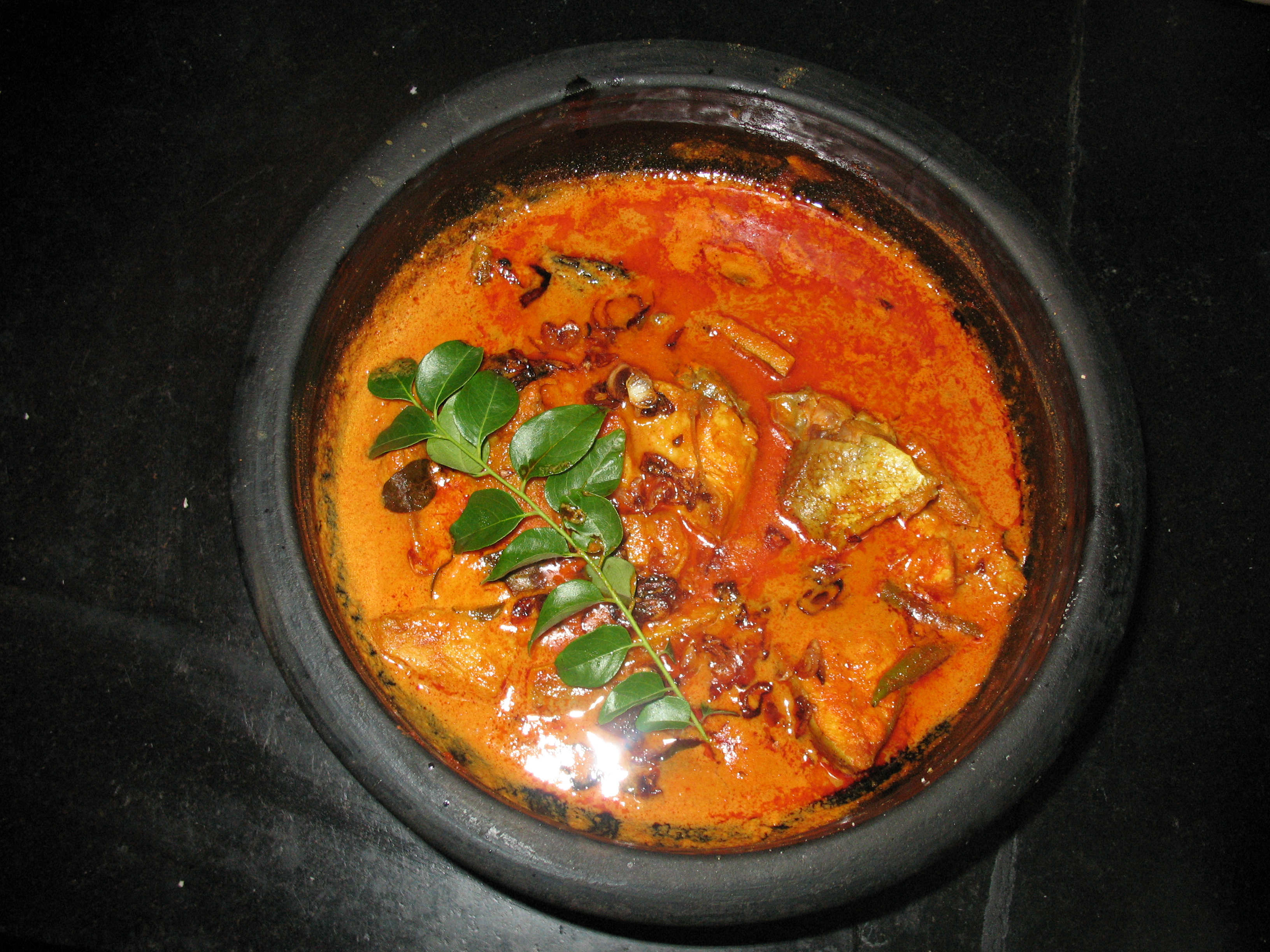 Kerala fish curry in a clay pot