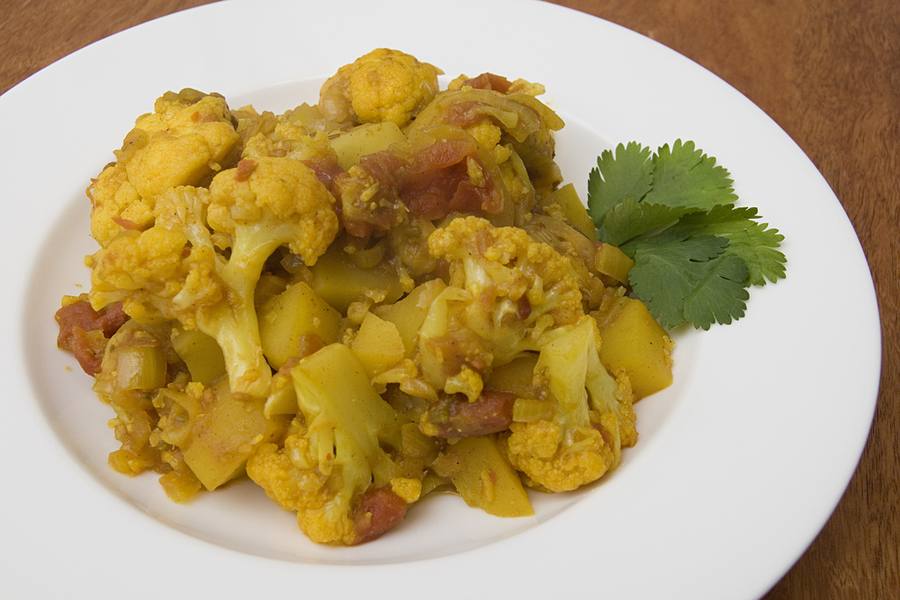 Aloo gobi, potato and cauliflower with tomato and coriander