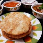 Dal pakwan, crisp fried discs with chana dal
