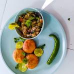 Litti served with chokha, lemon and green chilli